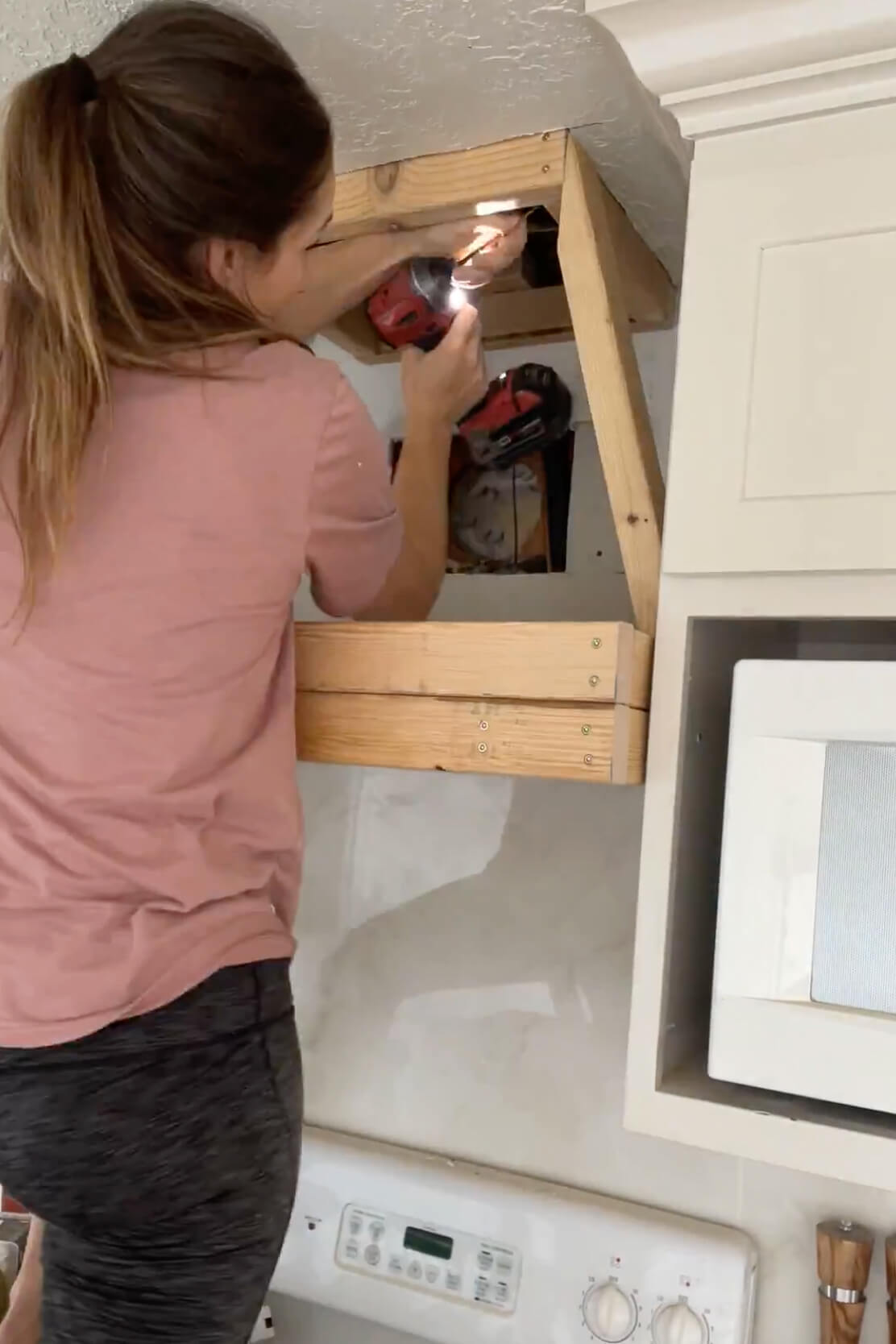 Framing a DIY range hood cover.